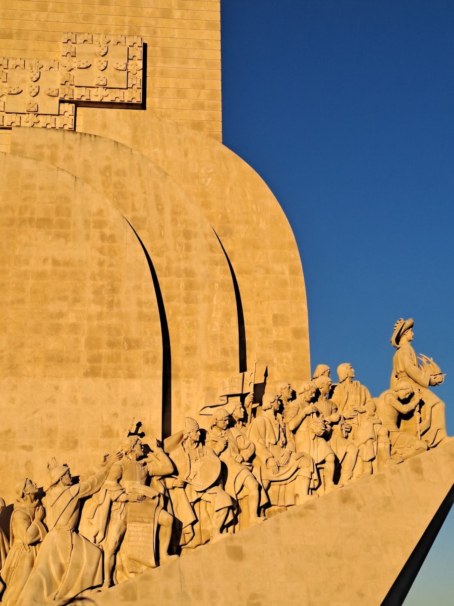 a statue of a group of people in front of a building